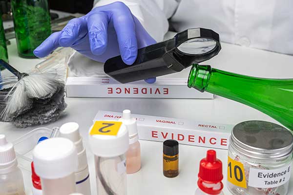 scientist-studying-evidence-for-criminal-case-and-evidence-is-labeled-numerically